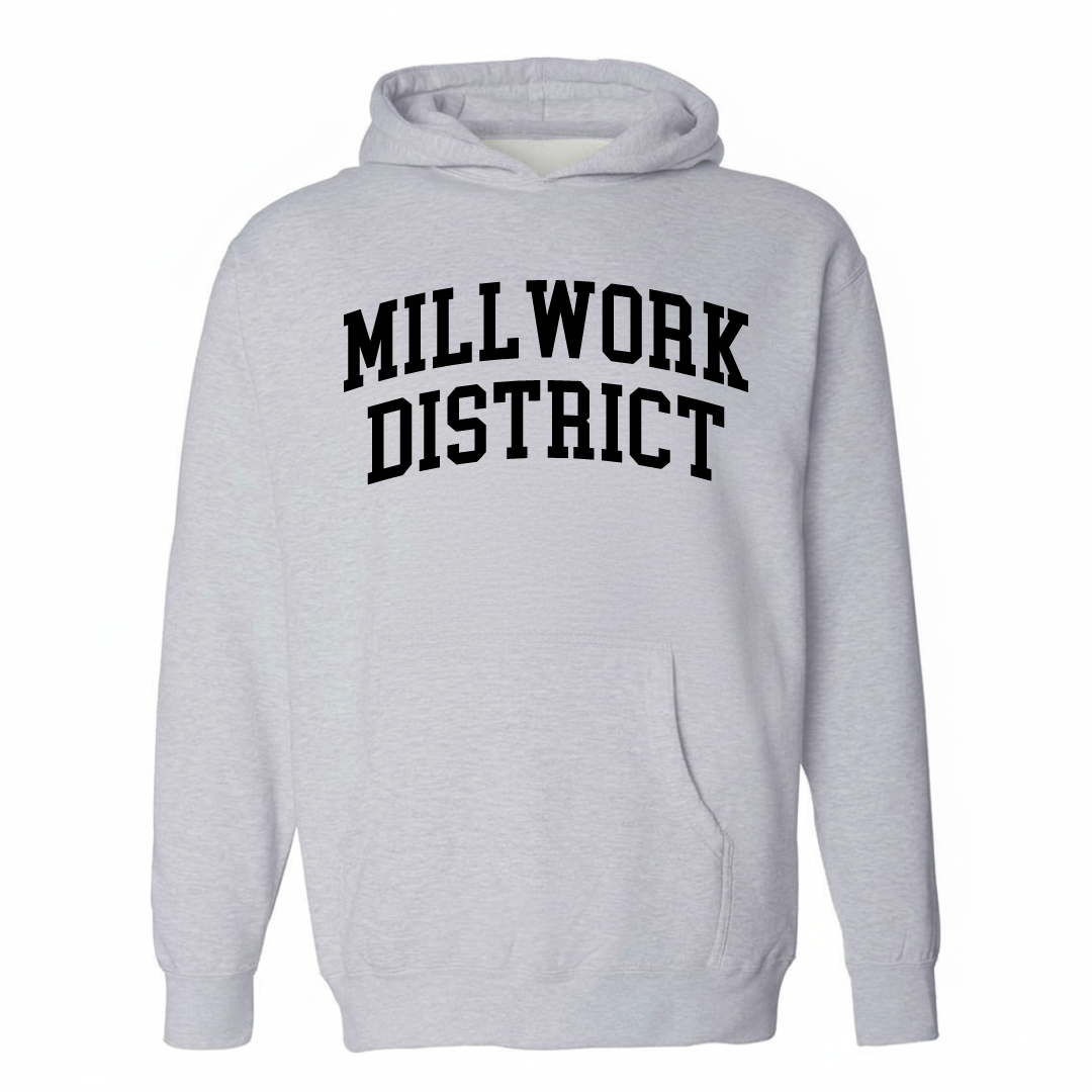Heather-gray hoodie with the Millwork District varsity arched lettering design on the chest.