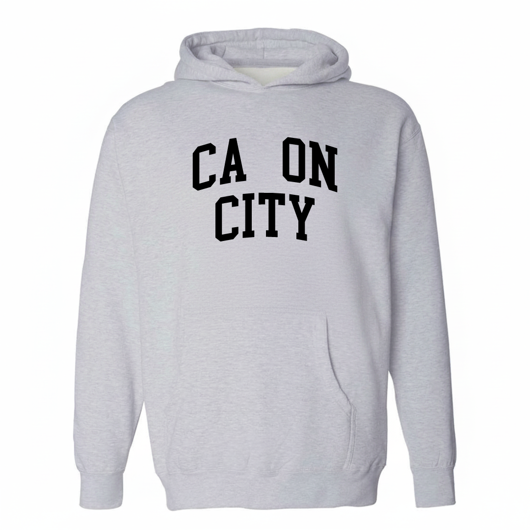 Heather-gray hoodie with the Cañon City arched varsity lettering design on the chest.