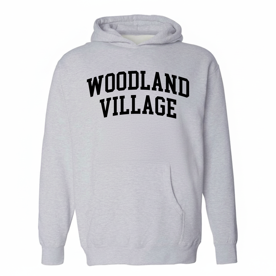 Heather-gray hoodie with the Woodland Village varsity arched lettering design on the chest.