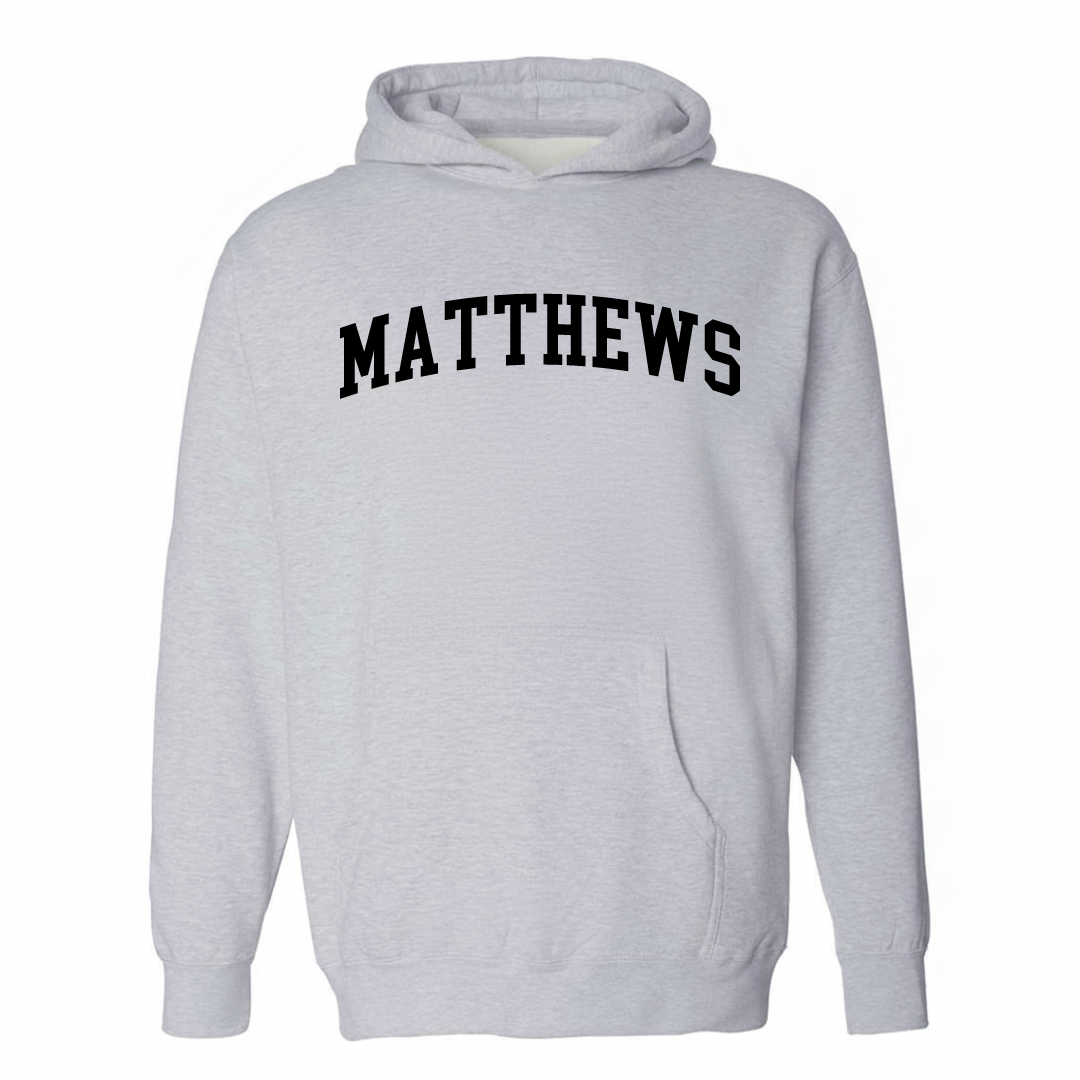 Heather-gray hoodie with the Matthews arched lettering varsity-collegiate design on the chest.